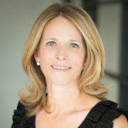 A woman in black shirt and white background